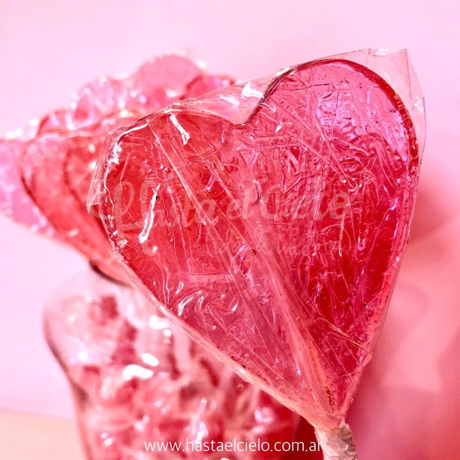 PALETAS DE CARAMELO CORAZON 6CM ROSA TRANSLUCIDO